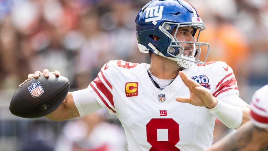 Sep 22, 2024; Cleveland, Ohio, USA; New York Giants quarterback Daniel Jones (8) throws the ball against the Cleveland Browns during the first quarter at Huntington Bank Field. Mandatory Credit: Scott Galvin-Imagn Images