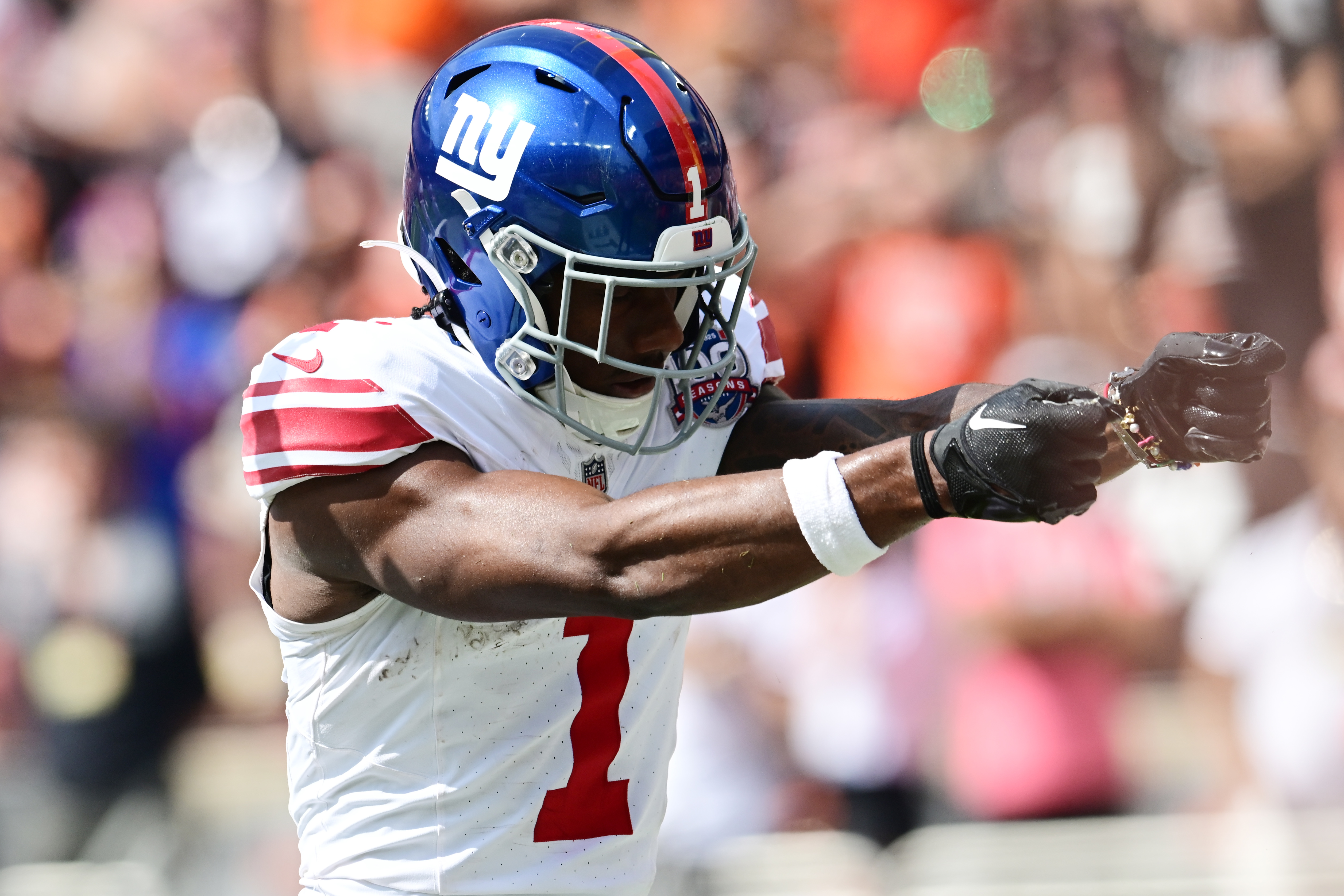 Sep 22, 2024; Cleveland, Ohio, USA; New York Giants wide receiver Malik Nabers (1) celebrates after catching a touchdown during the first half against the Cleveland Browns at Huntington Bank Field. Mandatory Credit: Ken Blaze-Imagn Images