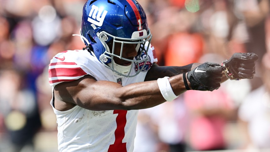 Sep 22, 2024; Cleveland, Ohio, USA; New York Giants wide receiver Malik Nabers (1) celebrates after catching a touchdown during the first half against the Cleveland Browns at Huntington Bank Field. Mandatory Credit: Ken Blaze-Imagn Images