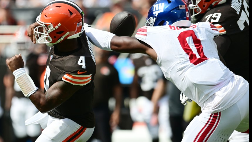 Sep 22, 2024; Cleveland, Ohio, USA; New York Giants linebacker Brian Burns (0) strip sacks Cleveland Browns quarterback Deshaun Watson (4) during the first half at Huntington Bank Field. Mandatory Credit: Ken Blaze-Imagn Images