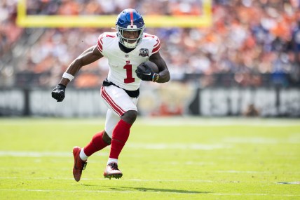 Sep 22, 2024; Cleveland, Ohio, USA; New York Giants wide receiver Malik Nabers (1) runs the ball against the Cleveland Browns during the second quarter at Huntington Bank Field. Mandatory Credit: Scott Galvin-Imagn Images