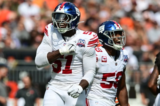 Sep 22, 2024; Cleveland, Ohio, USA; New York Giants linebacker Bobby Okereke (58) and New York Giants linebacker Azeez Ojulari (51) celebrate after a sack during the first quarter against the Cleveland Browns at Huntington Bank Field. Mandatory Credit: Ken Blaze-Imagn Images