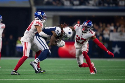 Nov 24, 2022; Arlington, Texas, USA; Dallas Cowboys wide receiver CeeDee Lamb (88) and New York Giants cornerback Nick McCloud (44) and cornerback Jason Pinnock (27) in action during the game between the Dallas Cowboys and the New York Giants at AT&T Stadium. Mandatory Credit: Jerome Miron-Imagn Images