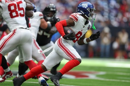 Aug 17, 2024; Houston, Texas, USA; New York Giants wide receiver Malik Nabers (9) runs with the ball during the game against the Houston Texans at NRG Stadium. Mandatory Credit: Troy Taormina-USA TODAY Sports