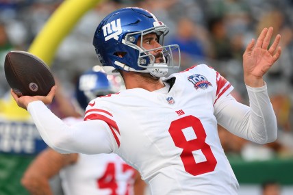 Aug 24, 2024; East Rutherford, New Jersey, USA; New York Giants quarterback Daniel Jones (8) warms up prior to the game against the New York Jets at MetLife Stadium. Mandatory Credit: Rich Barnes-Imagn Images