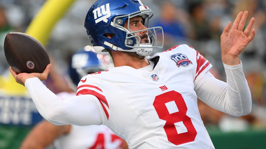 Aug 24, 2024; East Rutherford, New Jersey, USA; New York Giants quarterback Daniel Jones (8) warms up prior to the game against the New York Jets at MetLife Stadium. Mandatory Credit: Rich Barnes-Imagn Images