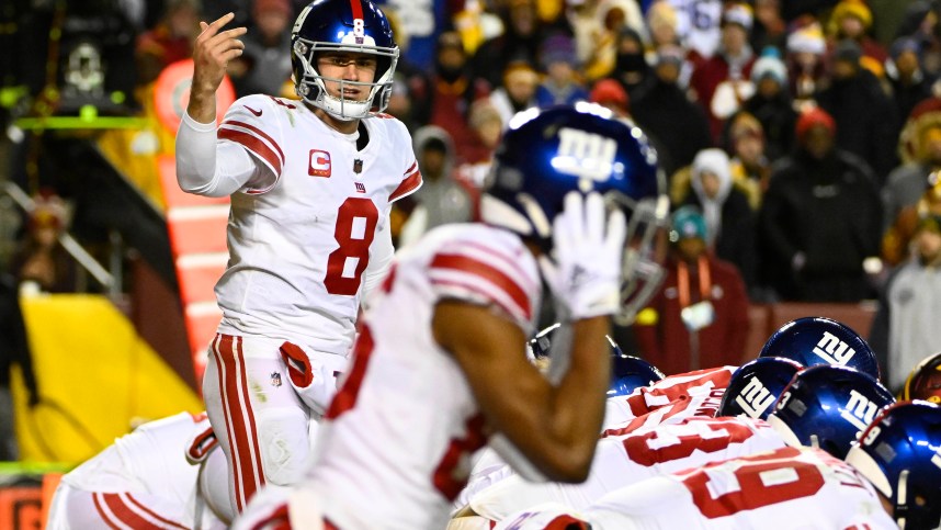 Dec 18, 2022; Landover, Maryland, USA; New York Giants quarterback Daniel Jones (8) gestures at the line of scrimmage against the Washington Commanders during the second half at FedExField. Mandatory Credit: Brad Mills-Imagn Images