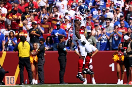 Sep 15, 2024; Landover, Maryland, USA; New York Giants cornerback Dru Phillips (22) reacts after a play during the first quarter against the Washington Commanders at Commanders Field. Mandatory Credit: Peter Casey-Imagn Images