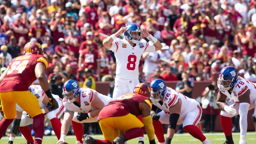 Sep 15, 2024; Landover, Maryland, USA; New York Giants quarterback Daniel Jones (8) calls a play in the first half against the New York Giants at Commanders Field. Mandatory Credit: Luke Johnson-Imagn Images