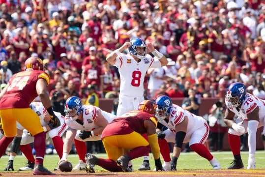 Sep 15, 2024; Landover, Maryland, USA; New York Giants quarterback Daniel Jones (8) calls a play in the first half against the New York Giants at Commanders Field. Mandatory Credit: Luke Johnson-Imagn Images