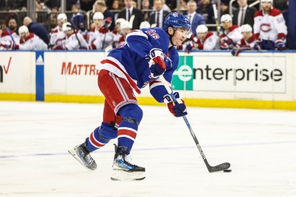 Apr 7, 2024; New York, New York, USA;  New York Rangers left wing Jimmy Vesey (26) looks to make a pass in the second period against the Montreal Canadiens at Madison Square Garden. Mandatory Credit: Wendell Cruz-Imagn Images