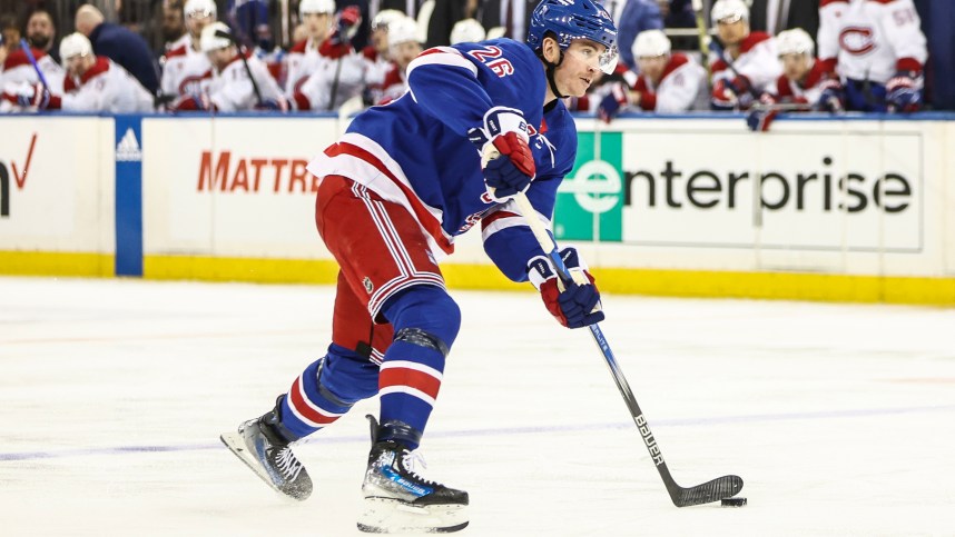 Apr 7, 2024; New York, New York, USA;  New York Rangers left wing Jimmy Vesey (26) looks to make a pass in the second period against the Montreal Canadiens at Madison Square Garden. Mandatory Credit: Wendell Cruz-Imagn Images