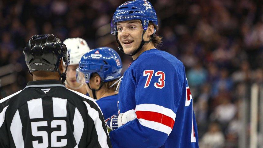 Sep 24, 2024; New York, New York, USA; New York Rangers center Matt Rempe (73) speaks with a linesman  during the second period against the New York Islanders at Madison Square Garden. Mandatory Credit: Danny Wild-Imagn Images