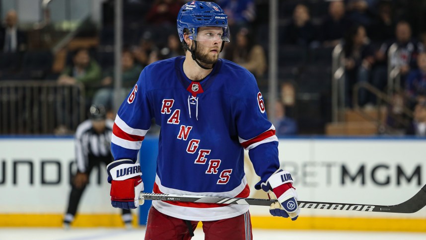 Sep 24, 2024; New York, New York, USA; New York Rangers defenseman Zac Jones (6) skates during the third period against the New York Islanders at Madison Square Garden. Mandatory Credit: Danny Wild-Imagn Images