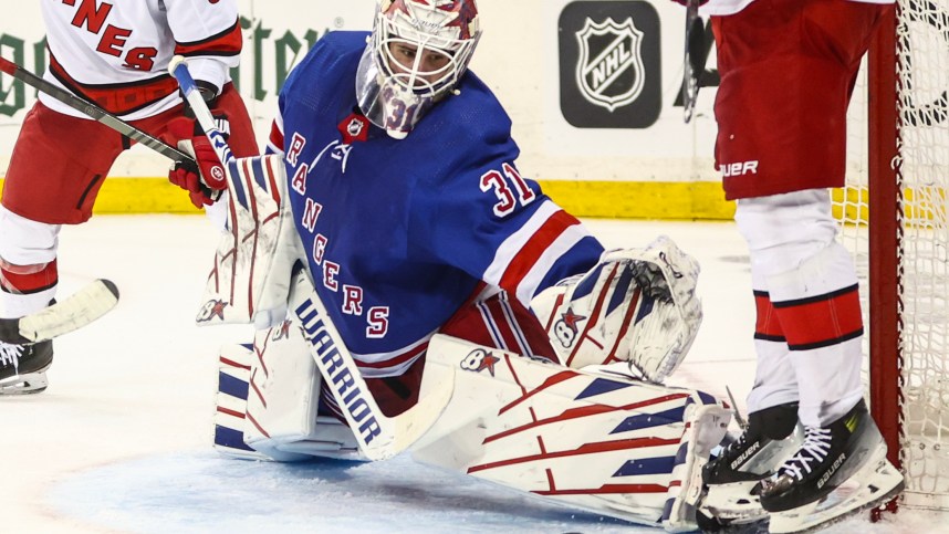 May 5, 2024; New York, New York, USA; New York Rangers goaltender Igor Shesterkin (31) makes a save in the third period against the Carolina Hurricanes in game one of the second round of the 2024 Stanley Cup Playoffs at Madison Square Garden. Mandatory Credit: Wendell Cruz-Imagn Images