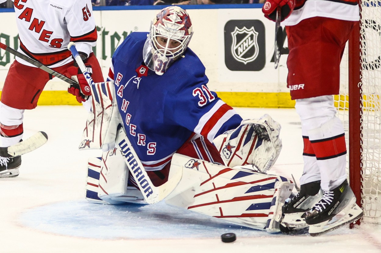 May 5, 2024; New York, New York, USA; New York Rangers goaltender Igor Shesterkin (31) makes a save in the third period against the Carolina Hurricanes in game one of the second round of the 2024 Stanley Cup Playoffs at Madison Square Garden. Mandatory Credit: Wendell Cruz-Imagn Images