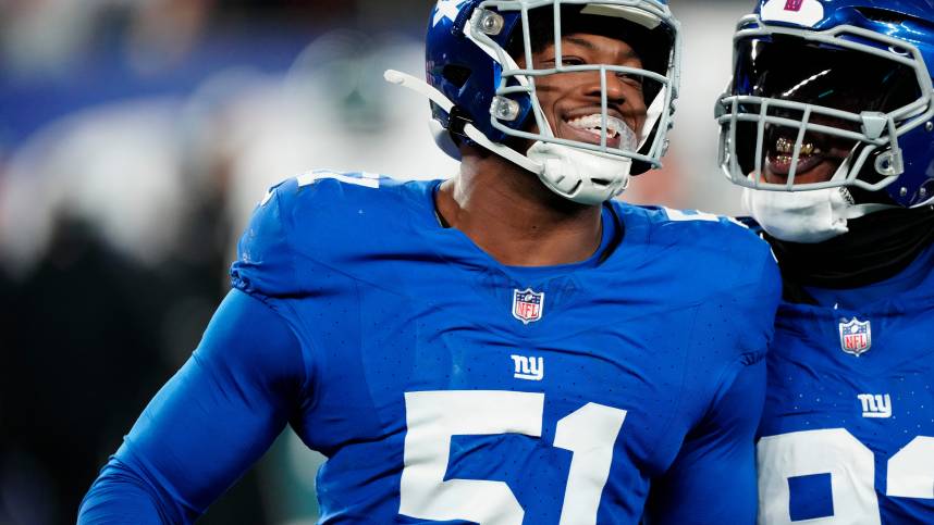 New York Giants linebacker Azeez Ojulari (51), New York Giants defensive tackle Rakeem Nunez-Roches (93) and the rest of Big Blue were all smiles as they beat the Philadelphia Eagles, 27-10, Sunday, January 7, 2024.