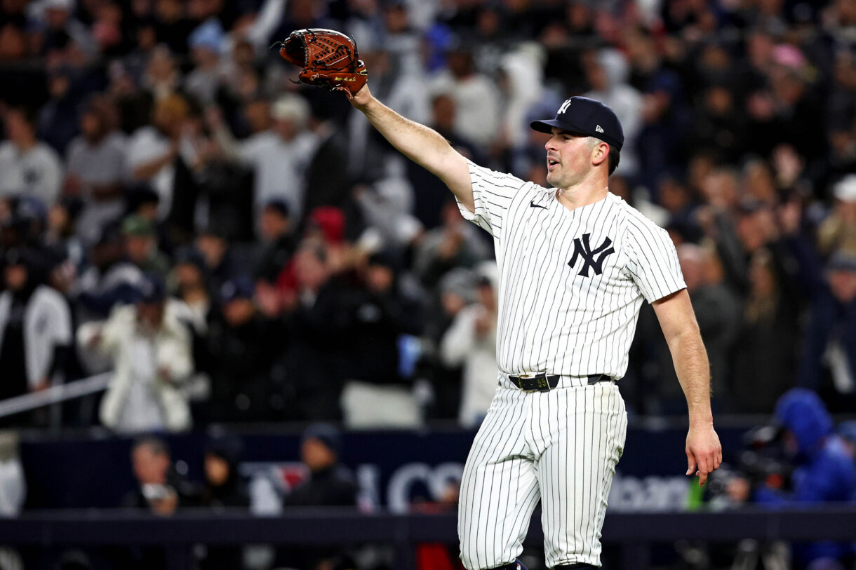 Oct 14, 2024; Bronx, New York, USA; New York Yankees pitcher Carlos Rodón (55) celebrates after a fly ball was caught to end the sixth inning against the Cleveland Guardians in game one of the ALCS for the 2024 MLB Playoffs at Yankee Stadium. Mandatory Credit: Wendell Cruz-Imagn Images