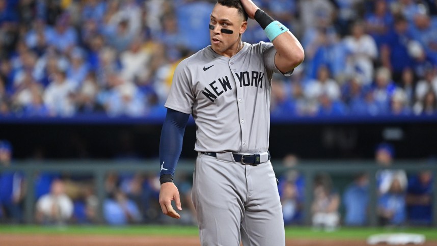 Oct 9, 2024; Kansas City, Missouri, USA; New York Yankees outfielder Aaron Judge (99) reacts in the fifth inning against the Kansas City Royals during game three of the NLDS for the 2024 MLB Playoffs at Kauffman Stadium. Mandatory Credit: Peter Aiken-Imagn Images