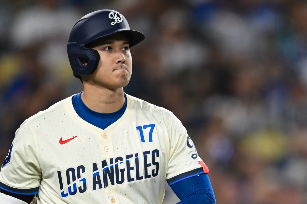 Sep 21, 2024; Los Angeles, California, USA; Los Angeles Dodgers designated hitter Shohei Ohtani (17) reacts after being struck by a pitch against the Colorado Rockies during the sixth inning at Dodger Stadium. Mandatory Credit: Jonathan Hui-Imagn Images