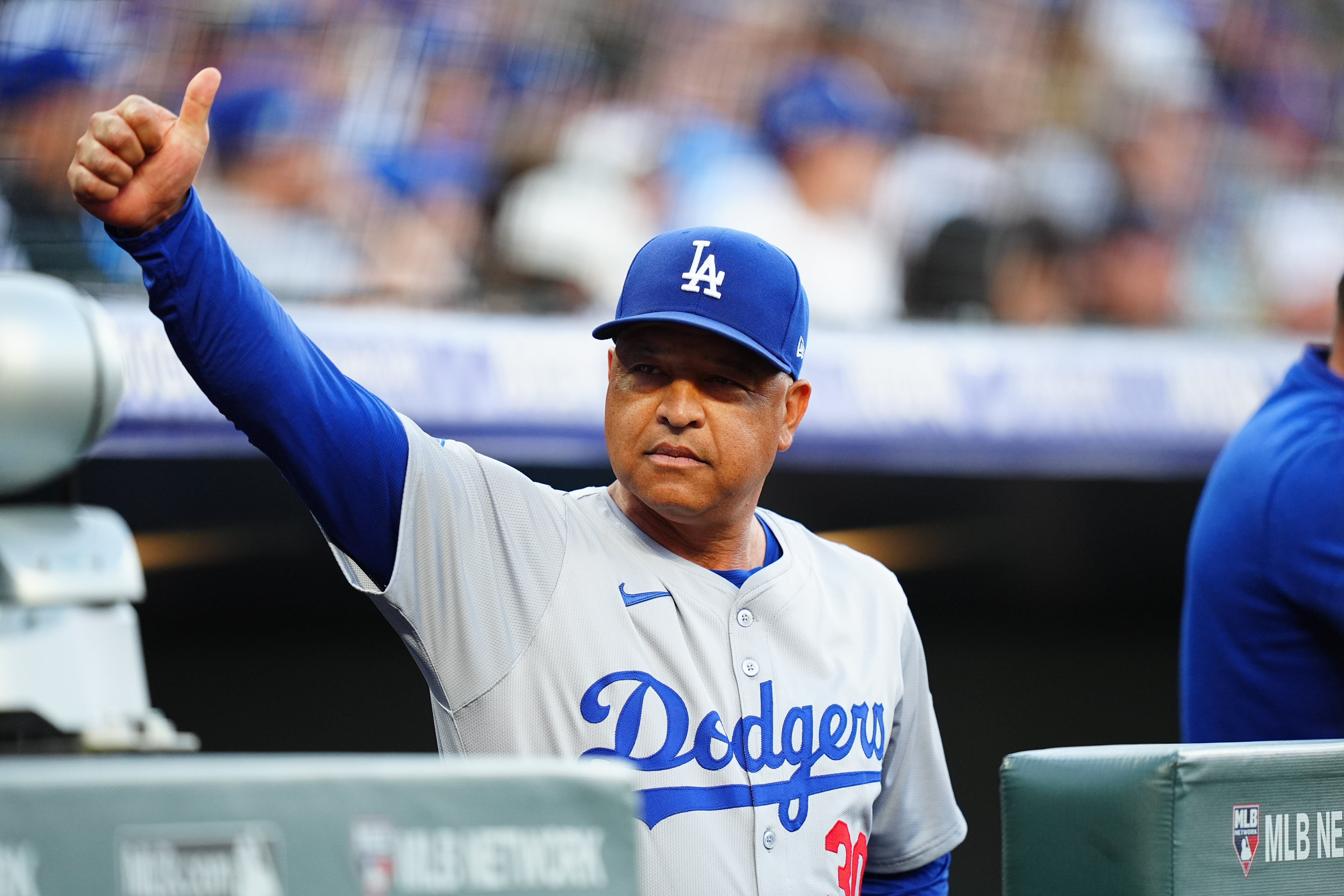 Sep 28, 2024; Denver, Colorado, USA; Los Angeles Dodgers manager Dave Roberts (30) before a game against the Colorado Rockies at Coors Field. Mandatory Credit: Ron Chenoy-Imagn Images