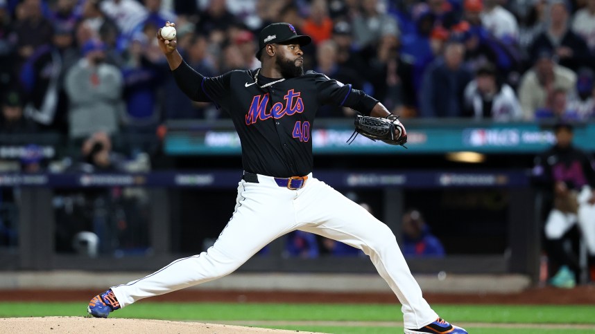 Oct 16, 2024; New York City, New York, USA; New York Mets pitcher Luis Severino (40) throws a pitch against the Los Angeles Dodgers in the first inning during game three of the NLCS for the 2024 MLB playoffs at Citi Field. Mandatory Credit: Wendell Cruz-Imagn Images