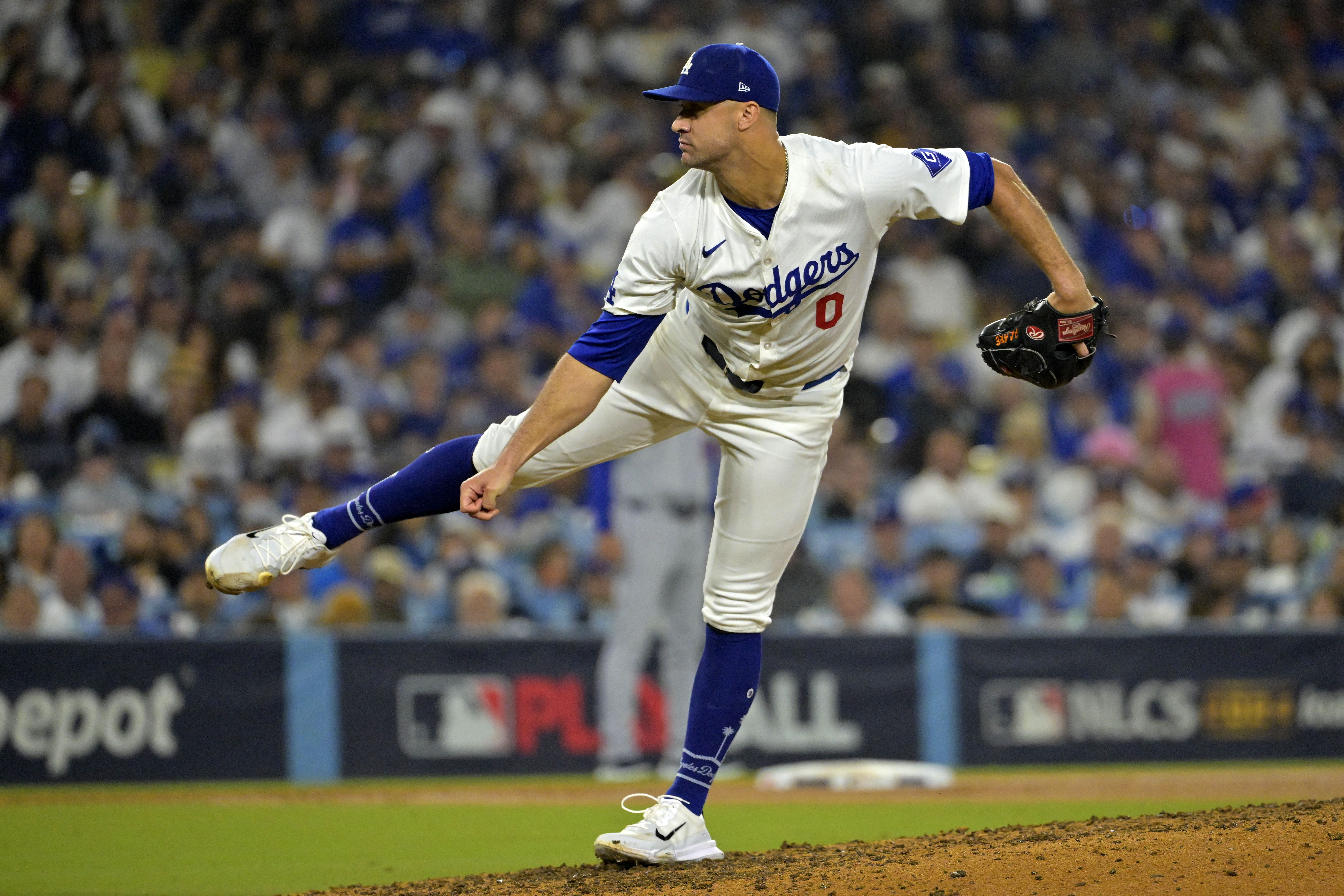 Oct 13, 2024; Los Angeles, California, USA; Los Angeles Dodgers pitcher Jack Flaherty (0) throws a pitch against the New York Mets in the seventh inning during game one of the NLCS for the 2024 MLB Playoffs at Dodger Stadium. Mandatory Credit: Jayne Kamin-Oncea-Imagn Images