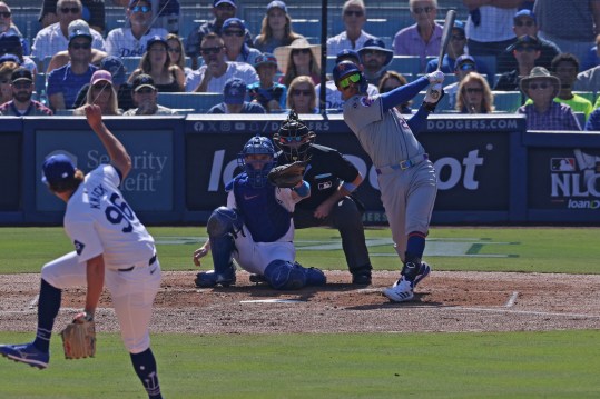 Oct 14, 2024; Los Angeles, California, USA; New York Mets third base Mark Vientos (27) hits a grand slam against Los Angeles Dodgers pitcher Landon Knack (96) in the second inning during game two of the NLCS for the 2024 MLB Playoffs at Dodger Stadium. Mandatory Credit: Jason Parkhurst-Imagn Images