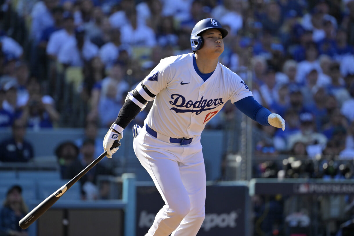 Oct 14, 2024; Los Angeles, California, USA; Los Angeles Dodgers designated hitter Shohei Ohtani (17) flies out against the New York Mets in the fifth inning during game two of the NLCS for the 2024 MLB Playoffs at Dodger Stadium. Mandatory Credit: Jayne Kamin-Oncea-Imagn Images