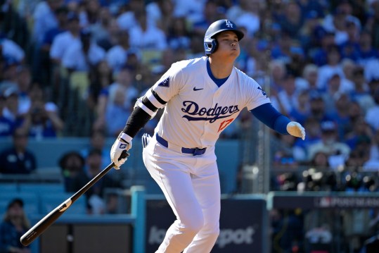 Oct 14, 2024; Los Angeles, California, USA; Los Angeles Dodgers designated hitter Shohei Ohtani (17) flies out against the New York Mets in the fifth inning during game two of the NLCS for the 2024 MLB Playoffs at Dodger Stadium. Mandatory Credit: Jayne Kamin-Oncea-Imagn Images