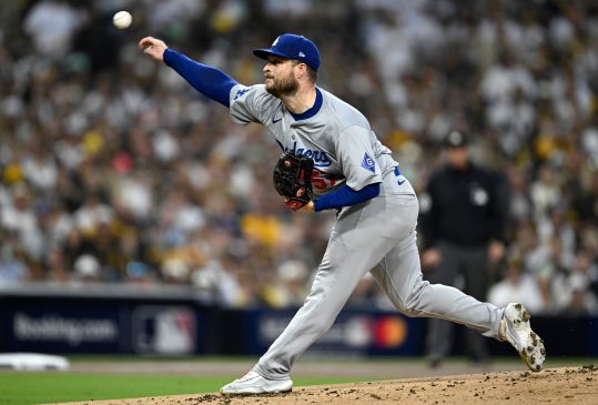 Oct 9, 2024; San Diego, California, USA; Los Angeles Dodgers pitcher Ryan Brasier (57) throws in the first inning against the San Diego Padres during game four of the NLDS for the 2024 MLB Playoffs at Petco Park.  Mandatory Credit: Denis Poroy-Imagn Images