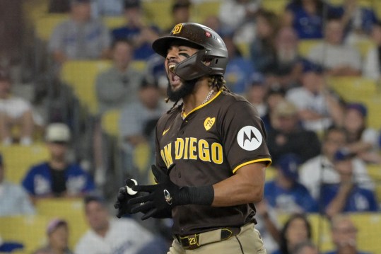 Oct 6, 2024; Los Angeles, California, USA; San Diego Padres outfielder Fernando Tatis Jr. (23) celebrates after hitting a two run home run in the ninth inning against the Los Angeles Dodgers during game two of the NLDS for the 2024 MLB Playoffs at Dodger Stadium. Mandatory Credit: Jayne Kamin-Oncea-Imagn Images