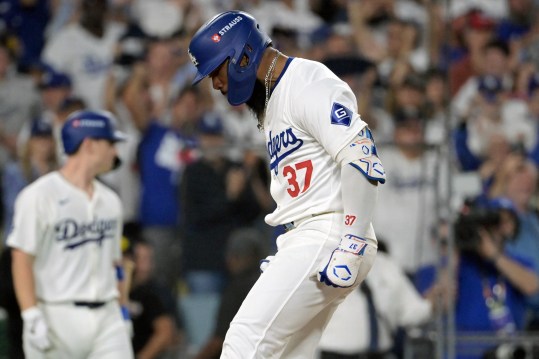 Oct 11, 2024; Los Angeles, California, USA; Los Angeles Dodgers outfielder Teoscar Hernandez (37) celebrates after hitting a solo home run in the seventh inning against the San Diego Padres during game five of the NLDS for the 2024 MLB Playoffs at Dodger Stadium. Mandatory Credit: Jayne Kamin-Oncea-Imagn Images