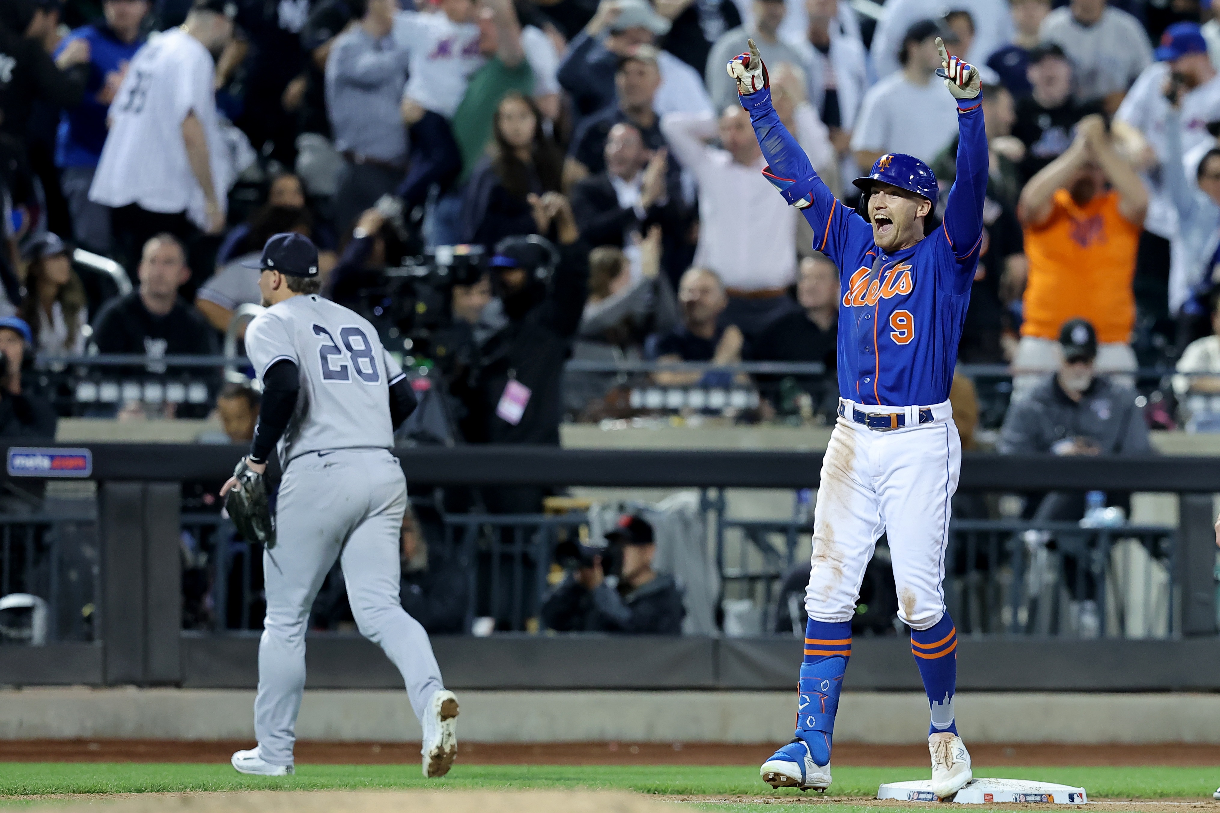 Jun 14, 2023; New York City, New York, USA; New York Mets center fielder Brandon Nimmo (9) celebrates after hitting a tenth inning walkoff double against the New York Yankees at Citi Field. Mandatory Credit: Brad Penner-Imagn Images