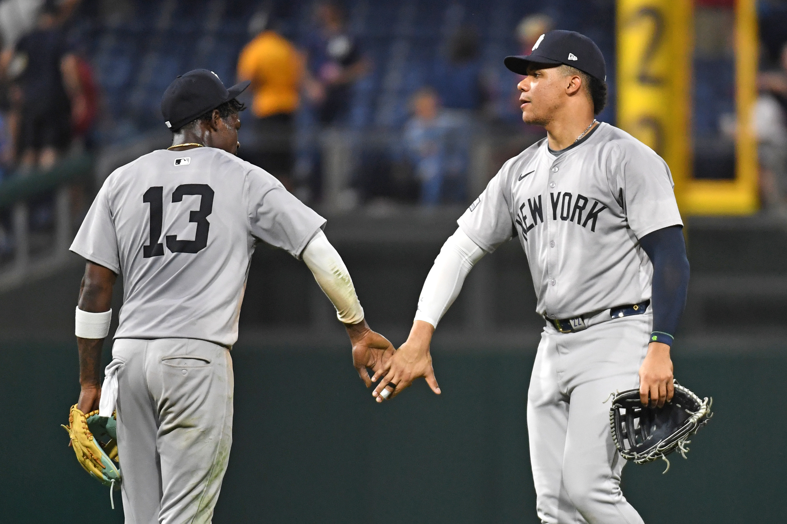 Jul 29, 2024; Philadelphia, Pennsylvania, USA; New York Yankees third baseman Jazz Chisholm, Jr (13) and outfielder Juan Soto (22) celebrate win against the Philadelphia Phillies at Citizens Bank Park. Mandatory Credit: Eric Hartline-Imagn Images