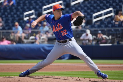 Feb 26, 2024; West Palm Beach, Florida, USA;  New York Mets starting pitcher Max Kranick (32) pitches against the Washington Nationals in the first inning at CACTI Park of the Palm Beaches. Mandatory Credit: Jim Rassol-Imagn Images