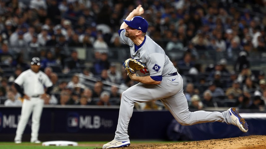 Oct 29, 2024; Bronx, New York, USA; Los Angeles Dodgers pitcher Daniel Hudson (41) throws a pitch against the New York Yankees in the third inning during game four of the 2024 MLB World Series at Yankee Stadium. Mandatory Credit: Vincent Carchietta-Imagn Images