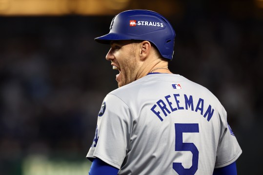 Oct 29, 2024; Bronx, New York, USA; Los Angeles Dodgers first baseman Freddie Freeman (5) reacts after hitting a RBI single against the New York Yankees in the fifth inning during game four of the 2024 MLB World Series at Yankee Stadium. Mandatory Credit: Vincent Carchietta-Imagn Images