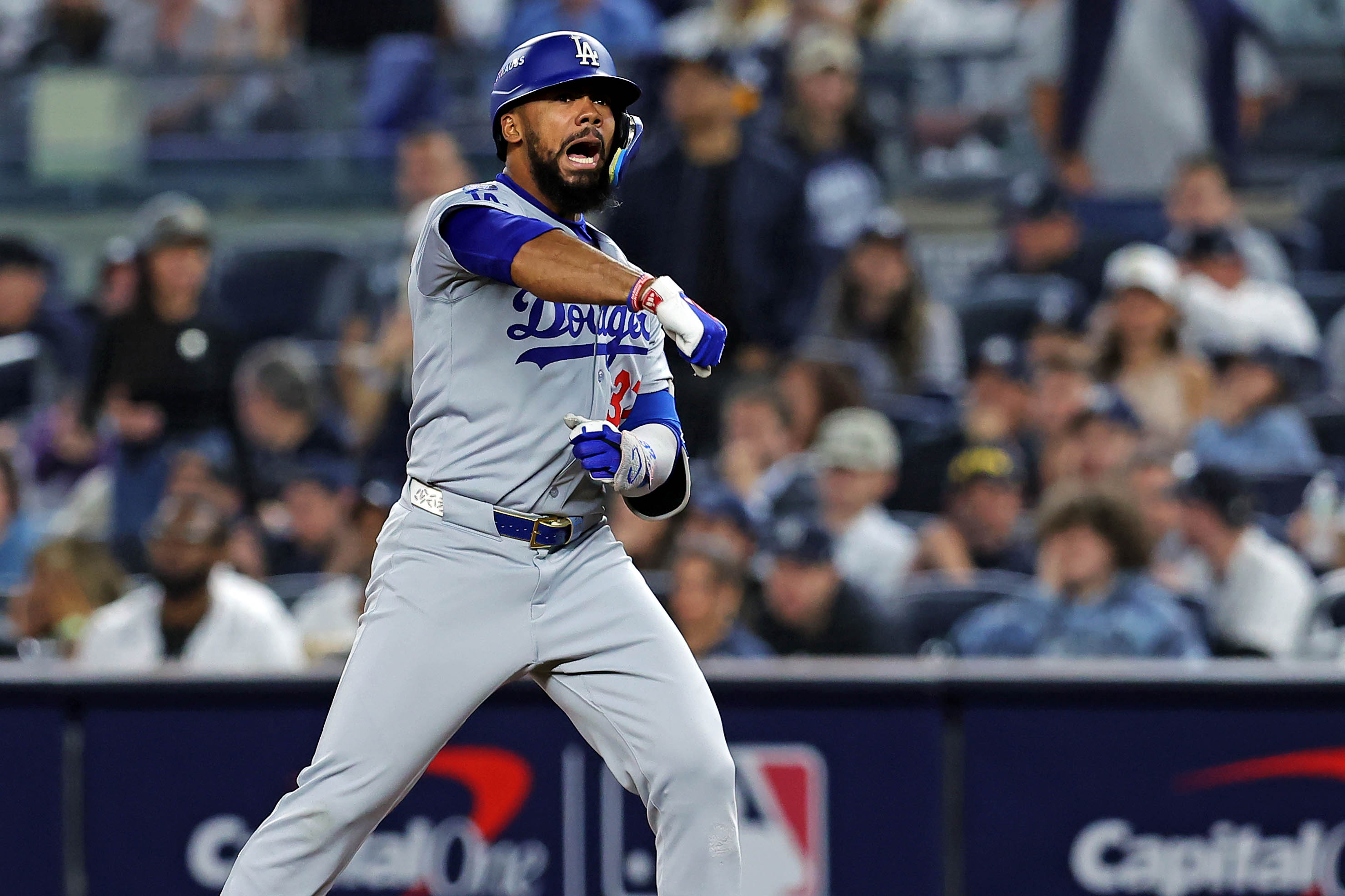 Oct 30, 2024; New York, New York, USA; Los Angeles Dodgers outfielder Teoscar Hernandez (37) celebrates after hitting a single during the ninth inning against the New York Yankees in game four of the 2024 MLB World Series at Yankee Stadium. Mandatory Credit: Brad Penner-Imagn Images