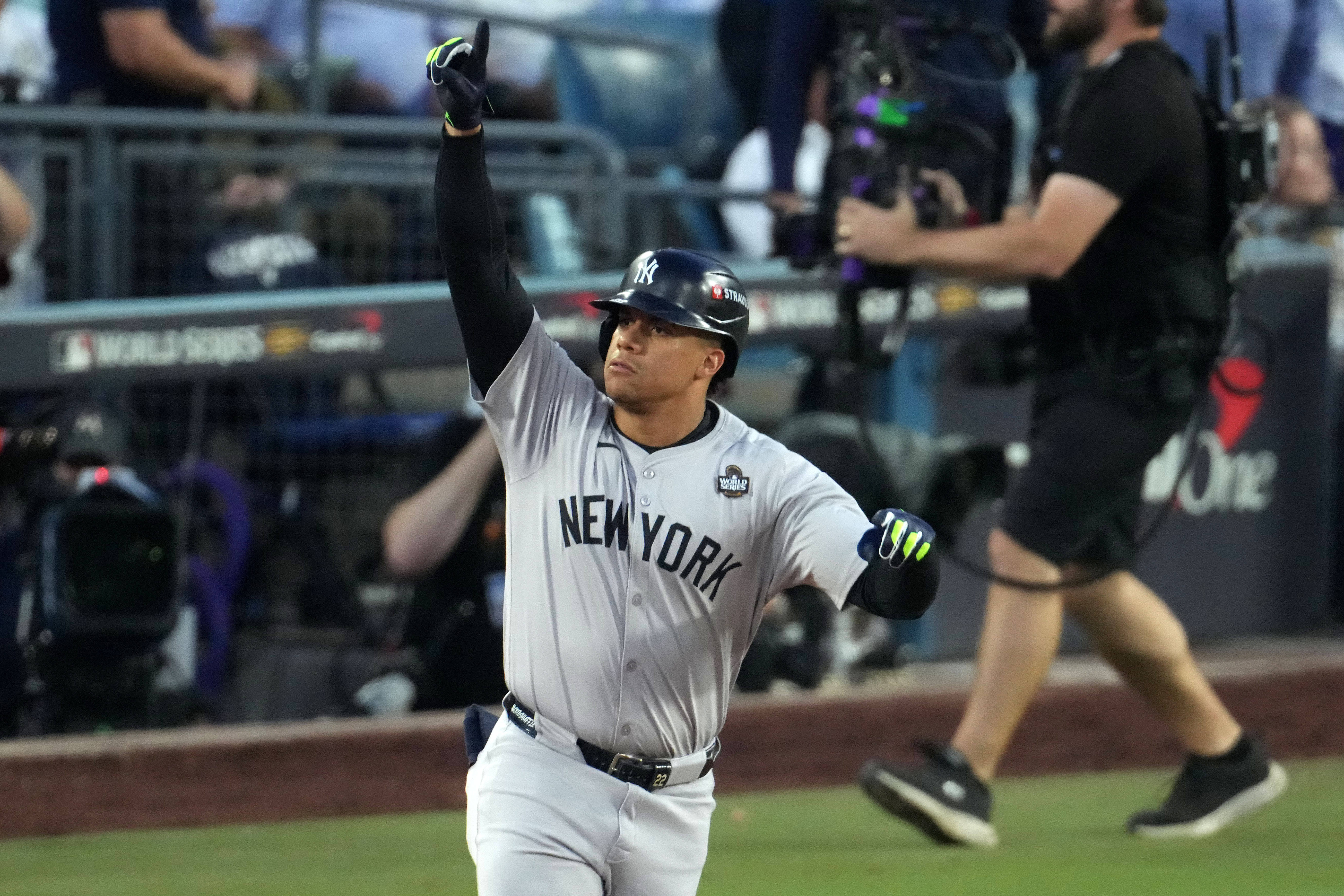 Oct 26, 2024; Los Angeles, California, USA; New York Yankees outfielder Juan Soto (22) reacts after hitting a home run against the Los Angeles Dodgers in the third inning for game two of the 2024 MLB World Series at Dodger Stadium. Mandatory Credit: Kirby Lee-Imagn Images