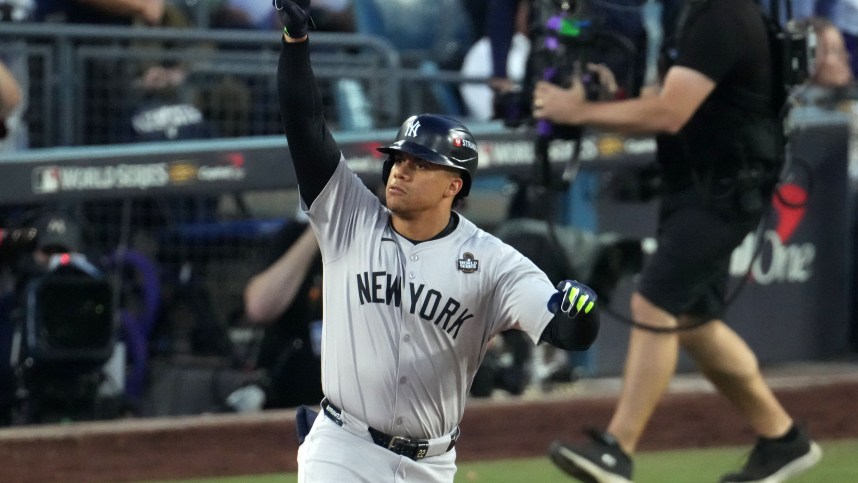 Oct 26, 2024; Los Angeles, California, USA; New York Yankees outfielder Juan Soto (22) reacts after hitting a home run against the Los Angeles Dodgers in the third inning for game two of the 2024 MLB World Series at Dodger Stadium. Mandatory Credit: Kirby Lee-Imagn Images