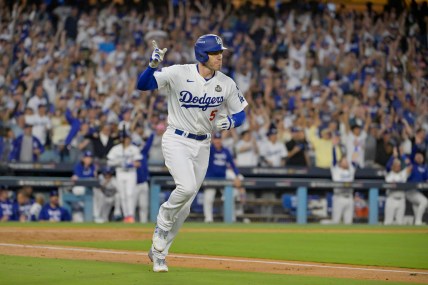 Oct 26, 2024; Los Angeles, California, USA; Los Angeles Dodgers first baseman Freddie Freeman (5) reacts after hitting a solo home run in the third inning against the New York Yankees during game two of the 2024 MLB World Series at Dodger Stadium. Mandatory Credit: Jayne Kamin-Oncea-Imagn Images