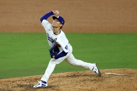 Oct 26, 2024; Los Angeles, California, USA; Los Angeles Dodgers pitcher Yoshinobu Yamamoto (18) throws a pitch against the New York Yankees in the seventh inning for game two of the 2024 MLB World Series at Dodger Stadium. Mandatory Credit: Kiyoshi Mio-Imagn Images