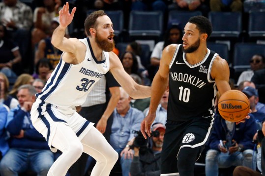 Oct 30, 2024; Memphis, Tennessee, USA; Brooklyn Nets guard Ben Simmons (10) handles the ball as Memphis Grizzlies center Jay Huff (30) defends during the second half at FedExForum. Mandatory Credit: Petre Thomas-Imagn Images