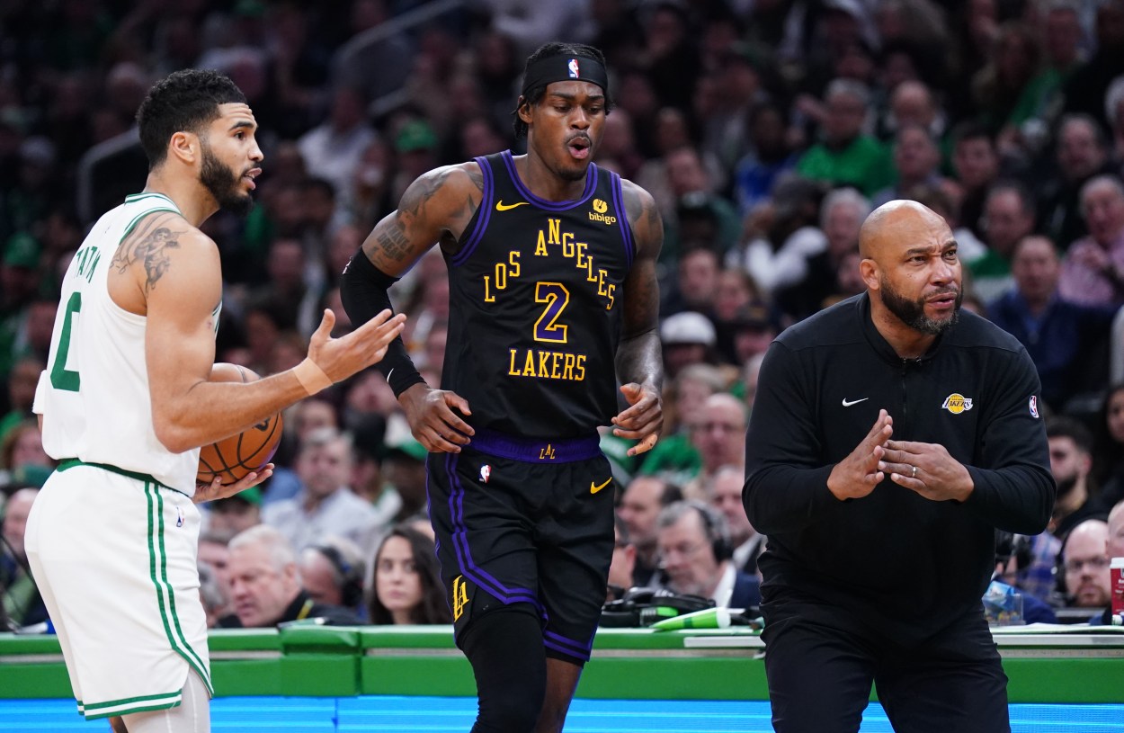 Feb 1, 2024; Boston, Massachusetts, USA; Los Angeles Lakers head coach Darvin Ham calls time out as forward Jarred Vanderbilt (2) is injured returning the ball against Boston Celtics forward Jayson Tatum (0) in the second quarter at TD Garden. Mandatory Credit: David Butler II-Imagn Images