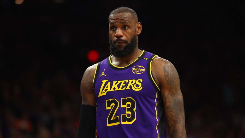 Oct 28, 2024; Phoenix, Arizona, USA; Los Angeles Lakers forward LeBron James (23) against the Phoenix Suns at Footprint Center. Mandatory Credit: Mark J. Rebilas-Imagn Images