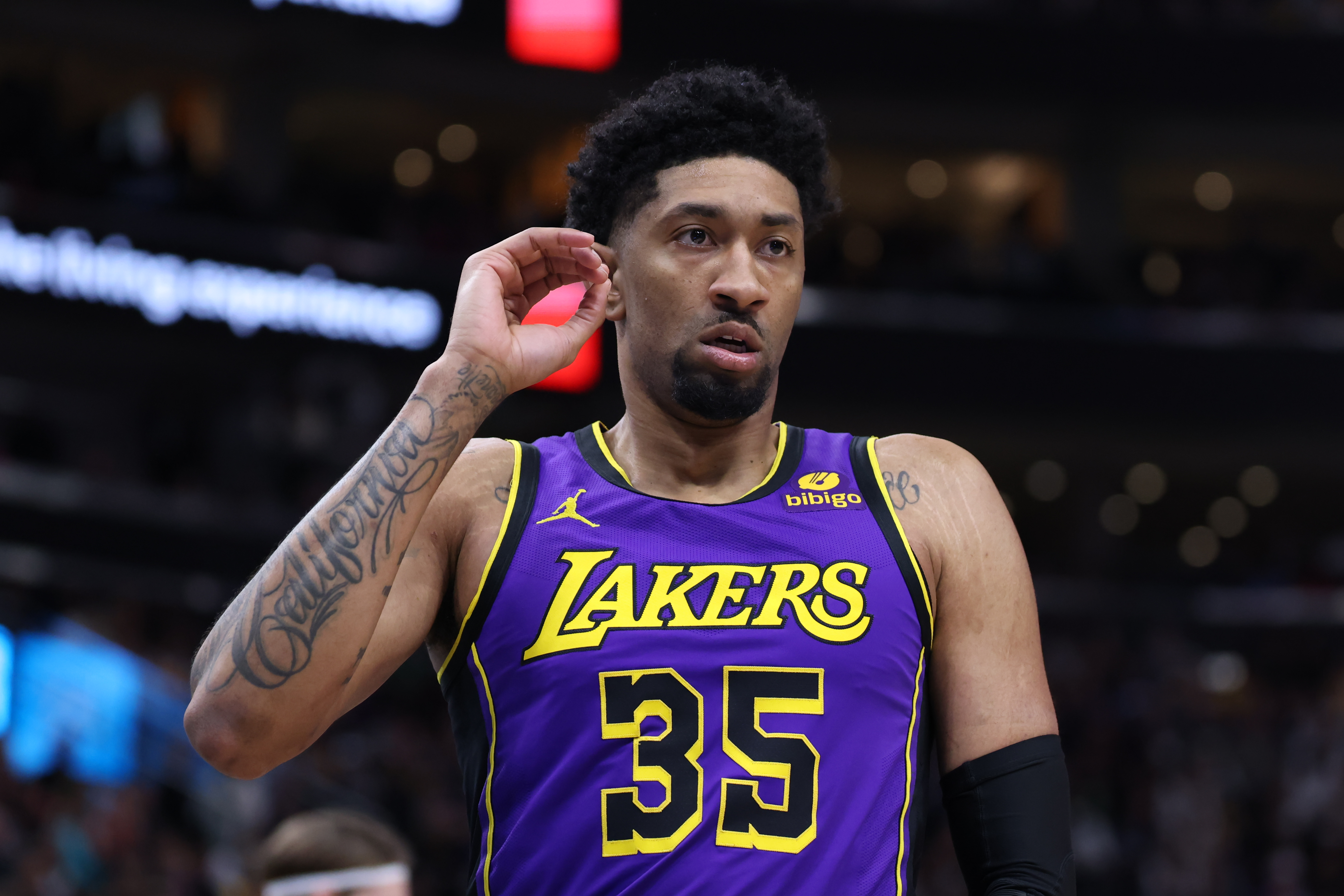 Jan 13, 2024; Salt Lake City, Utah, USA; Los Angeles Lakers forward Christian Wood (35) reacts to a play against the Utah Jazz during the second quarter at Delta Center. Mandatory Credit: Rob Gray-Imagn Images