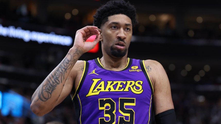 Jan 13, 2024; Salt Lake City, Utah, USA; Los Angeles Lakers forward Christian Wood (35) reacts to a play against the Utah Jazz during the second quarter at Delta Center. Mandatory Credit: Rob Gray-Imagn Images