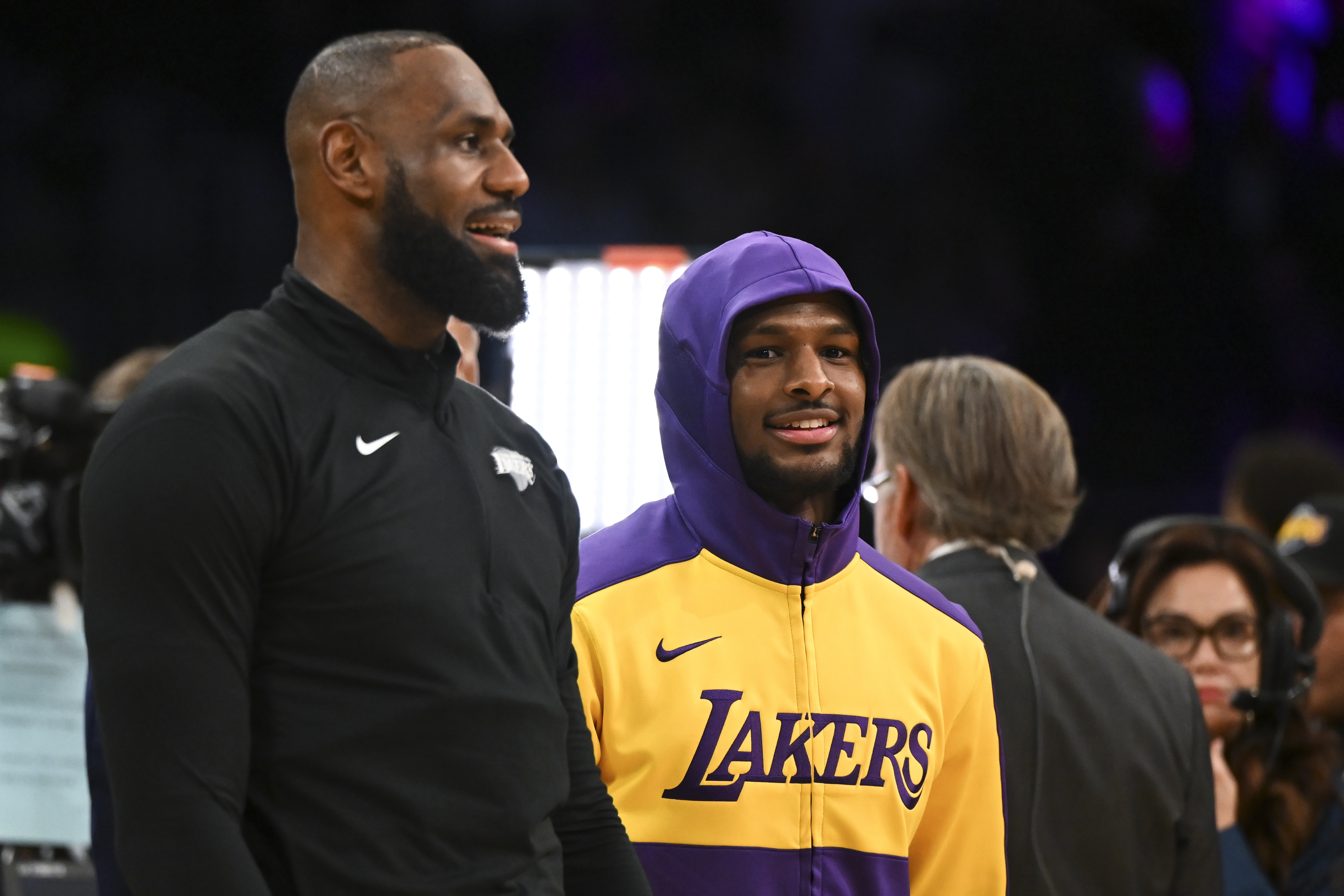 Oct 25, 2024; Los Angeles, California, USA; Los Angeles Lakers guard Bronny James (9) and forward LeBron James (23) warming up before the game against the Phoenix Suns at Crypto.com Arena. Mandatory Credit: Jonathan Hui-Imagn Images