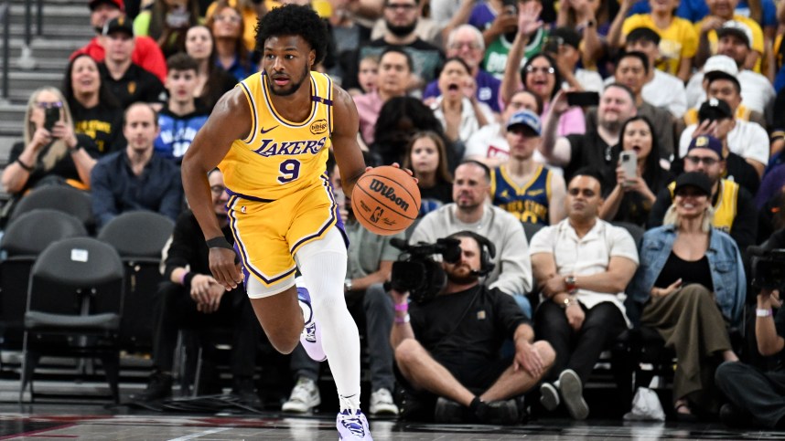 Oct 15, 2024; Las Vegas, Nevada, USA; Los Angeles Lakers guard Bronny James (9) dribbles the ball up the court against the Golden State Warriors in the fourth quarter of their preseason game at T-Mobile Arena. Mandatory Credit: Candice Ward-Imagn Images